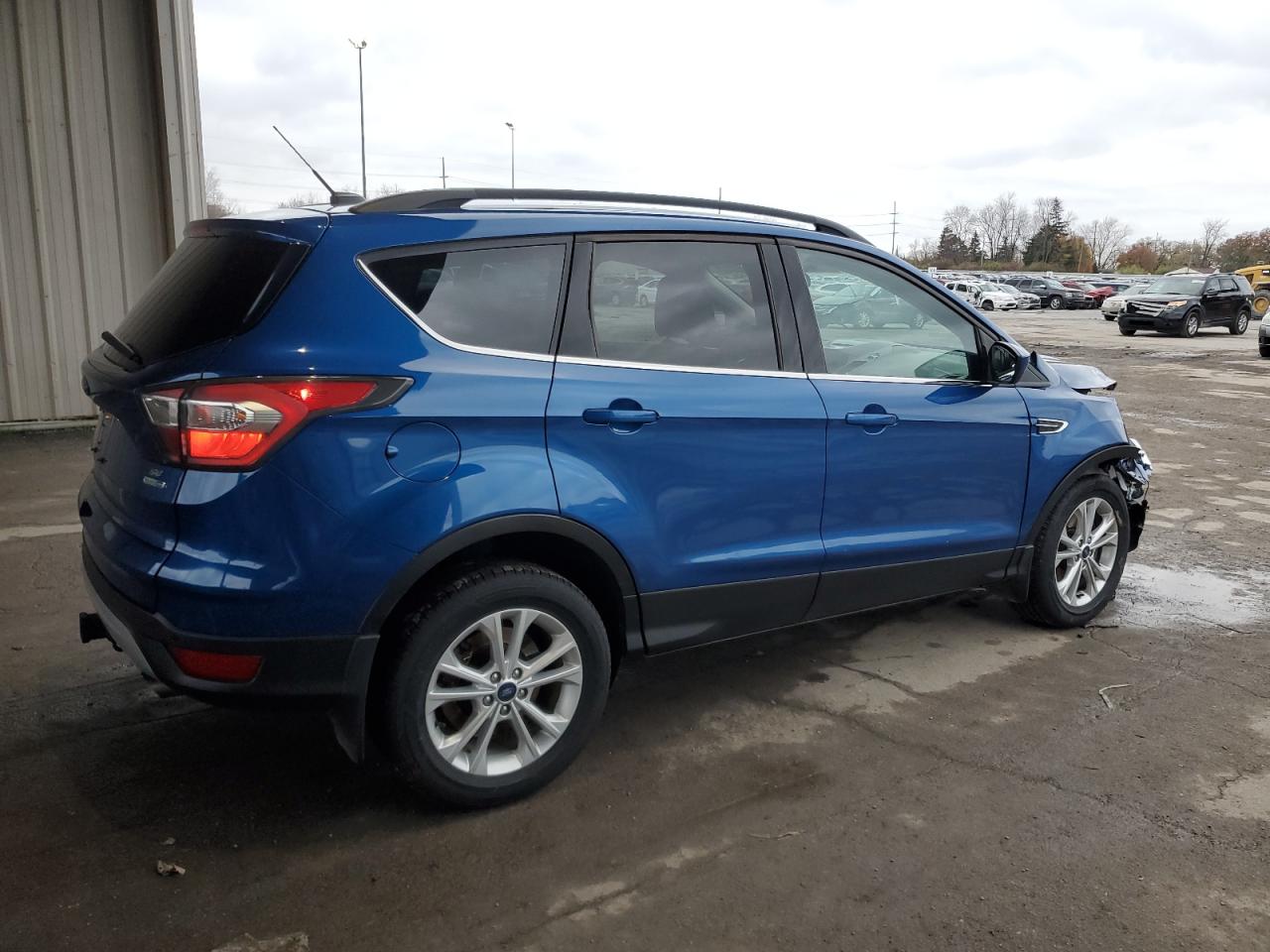 2017 Ford Escape VIN 1FMCU9G98HUA71232 Copart auction photo, front end / side damage thumbnail 3