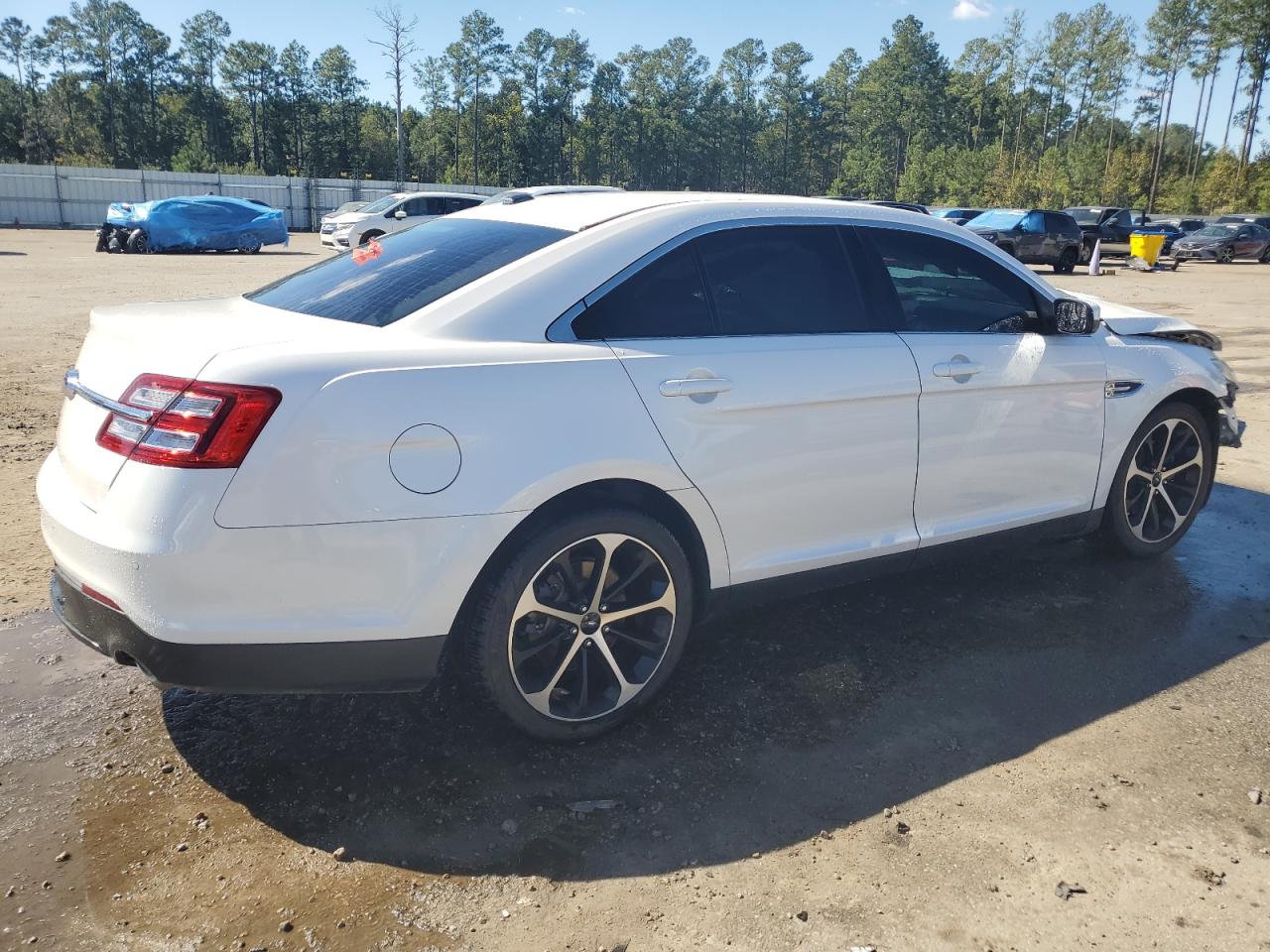 2015 Ford Taurus VIN 1FAHP2E8XFG123612 Copart auction photo, front end / side damage thumbnail 3