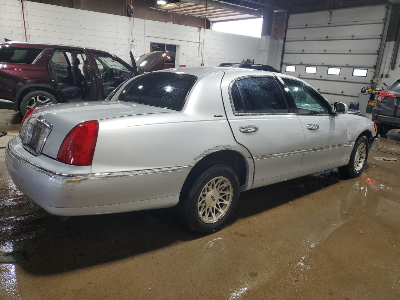 1998 Lincoln Town Car VIN 1LNFM82W8WY666012 Copart auction photo, front end / all over damage thumbnail 3