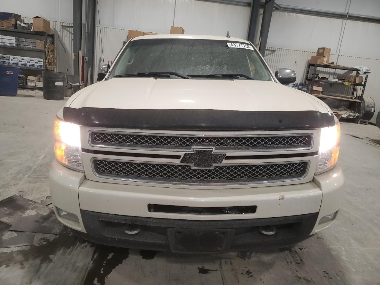 2012 Chevrolet Silverado VIN 3GCPKTE75CG162822 Copart auction photo, undercarriage damage thumbnail 5