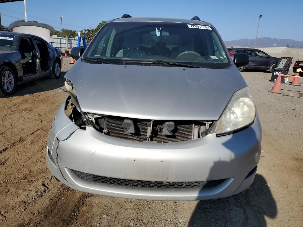 2010 Toyota Sienna VIN 5TDKK4CC0AS335855 Copart auction photo, side / front end damage thumbnail 5