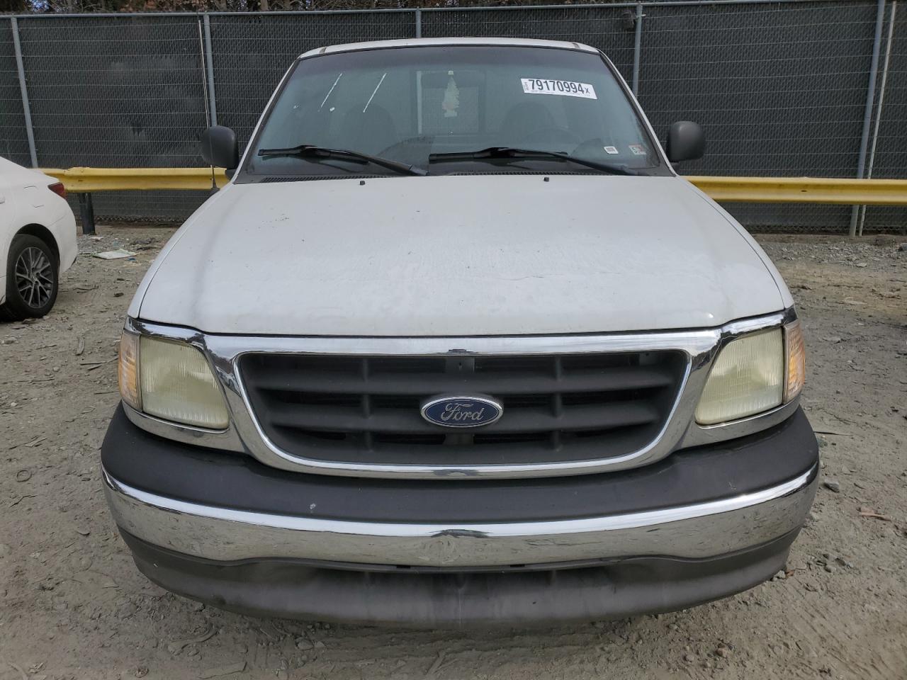 2003 Ford F-150 VIN 1FTRF17293NA76780 Copart auction photo, minor dent/scratches damage thumbnail 5