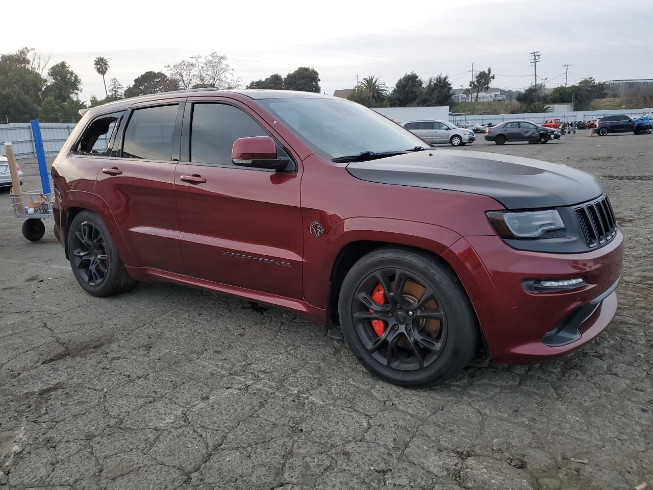 2016 Jeep Grand Cherokee VIN 1C4RJFDJ7GC486695 Copart auction photo, vandalism / all over damage thumbnail 4