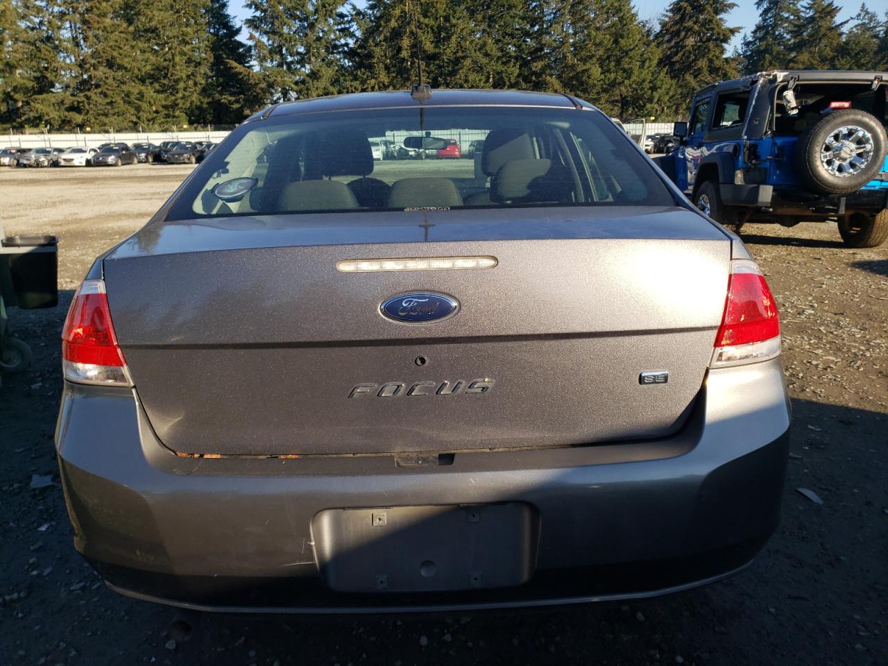 2009 Ford Focus VIN 1FAHP35N49W156434 Copart auction photo, side damage thumbnail 6