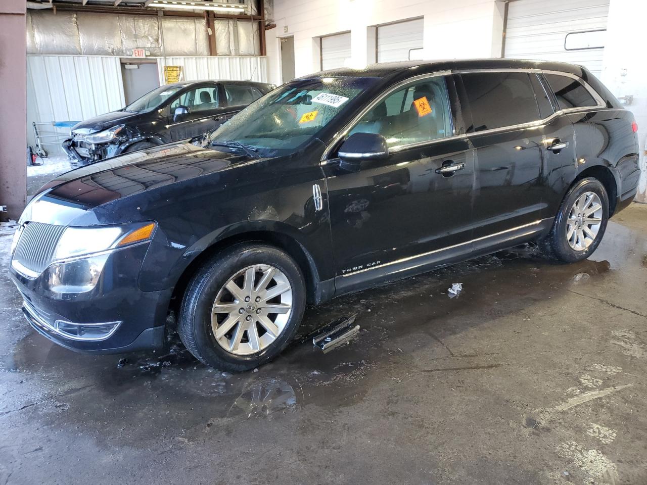 2015 Lincoln MKT VIN 2LMHJ5NK4FBL01062 - Copart auction photo