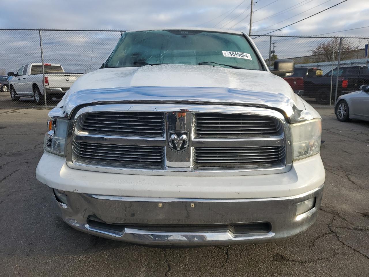 2011 Dodge RAM VIN 1D7RV1GT0BS705652 Copart auction photo, vandalism / all over damage thumbnail 5