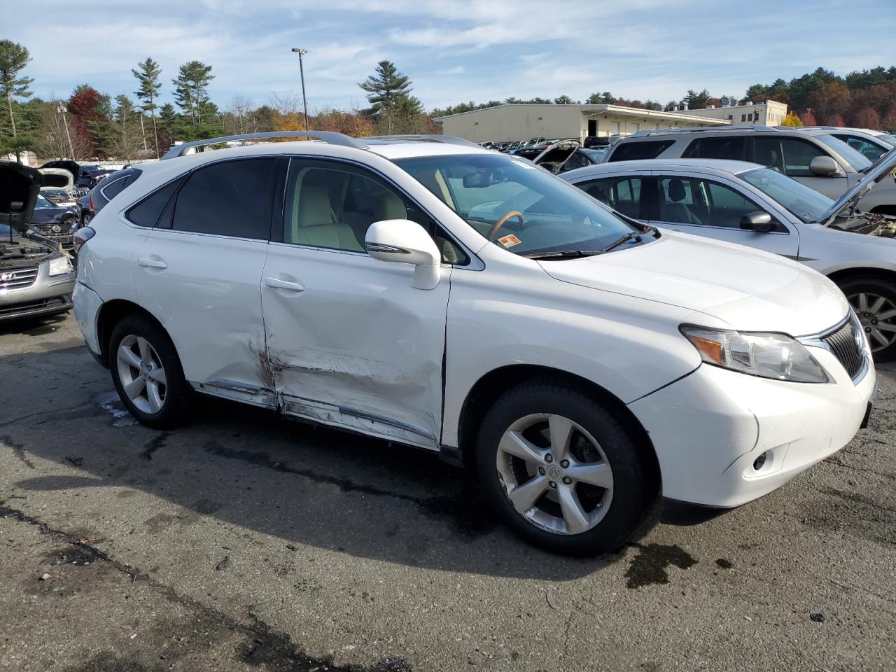 2010 Lexus RX VIN 2T2BK1BA2AC039707 Copart auction photo, side / minor dent/scratches damage thumbnail 4