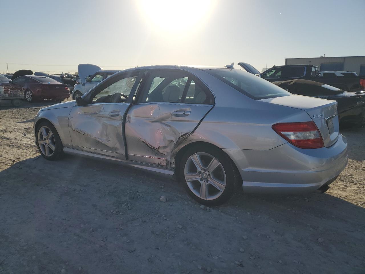2010 Mercedes-Benz C-klasse VIN WDDGF5EB4AR097694 Copart auction photo, side damage thumbnail 2