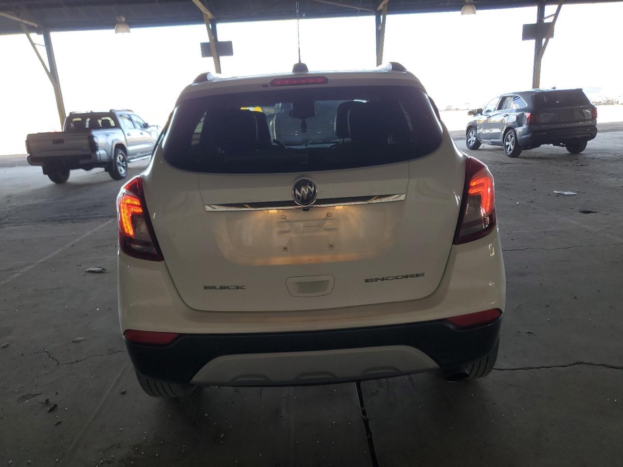 2018 Buick Encore VIN KL4CJASB1JB694728 Copart auction photo, side / rear end damage thumbnail 6