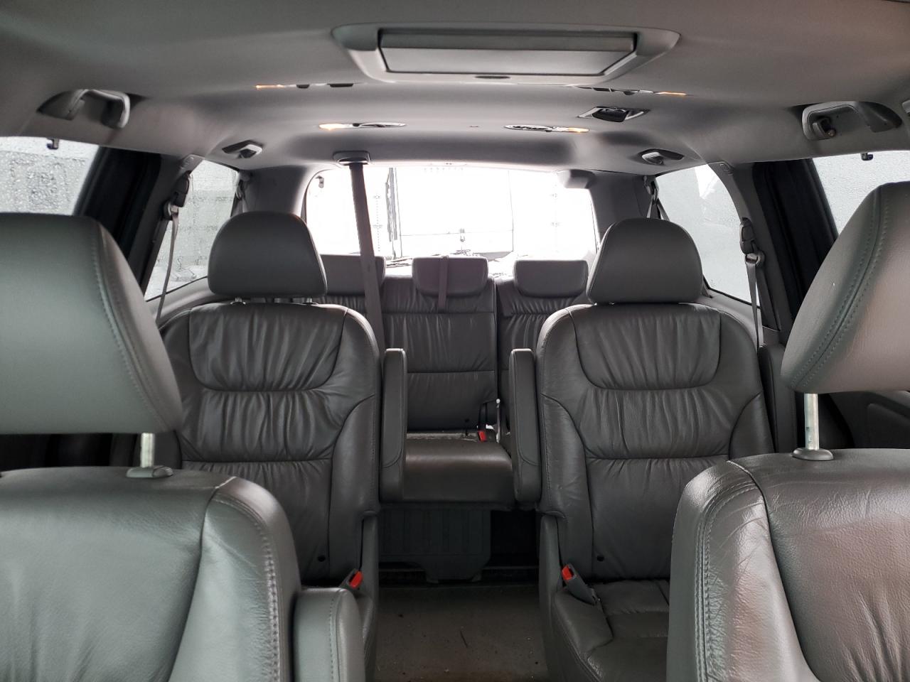 2010 Honda Odyssey VIN 5FNRL3H73AB106415 Copart auction photo, all over damage thumbnail 10