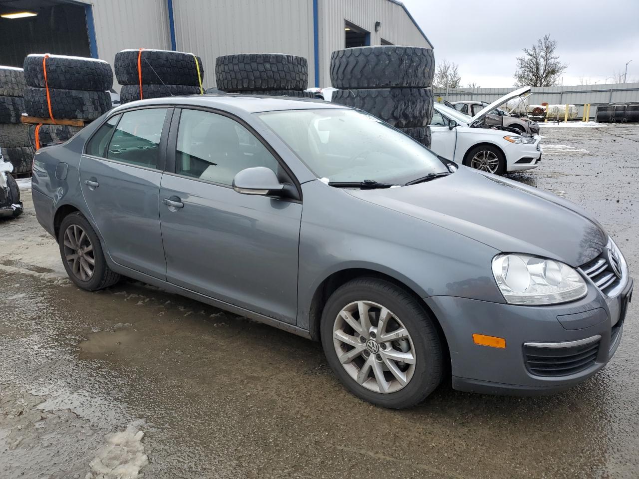 2010 Volkswagen Jetta VIN 3VWRZ7AJ0AM143684 Copart auction photo, rear end damage thumbnail 4