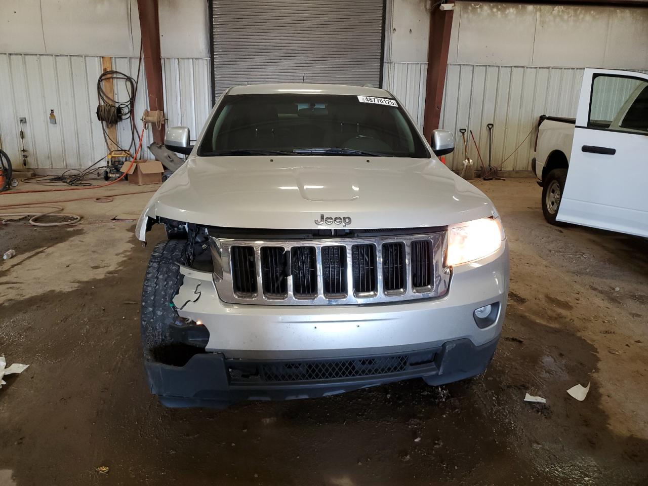 2011 Jeep Grand Cherokee VIN 1J4RR4GG5BC581272 Copart auction photo, front end damage thumbnail 5