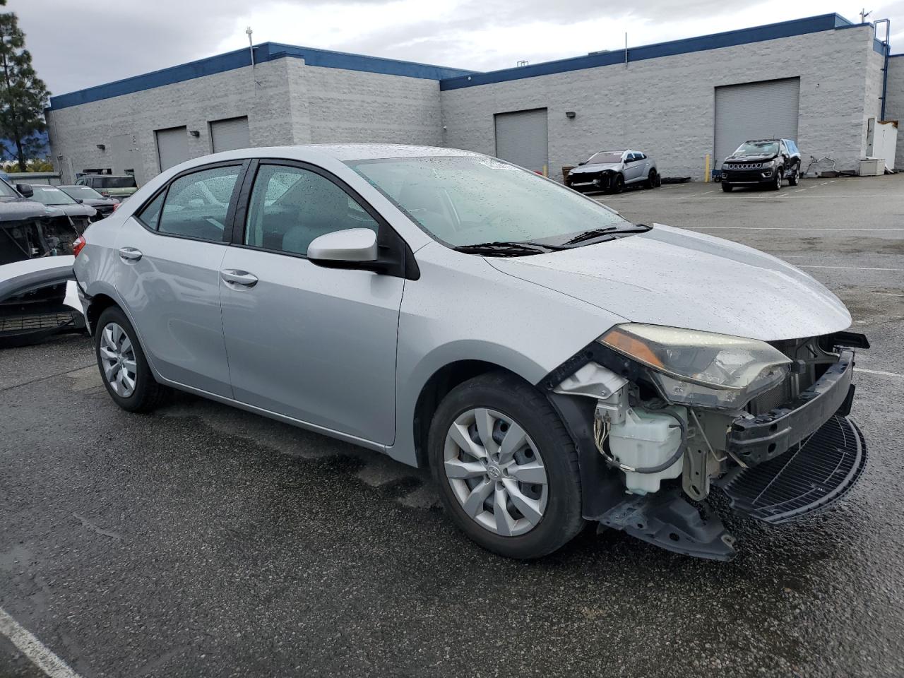 2015 Toyota Corolla VIN 5YFBURHE7FP285716 Copart auction photo, front end / rear end damage thumbnail 4