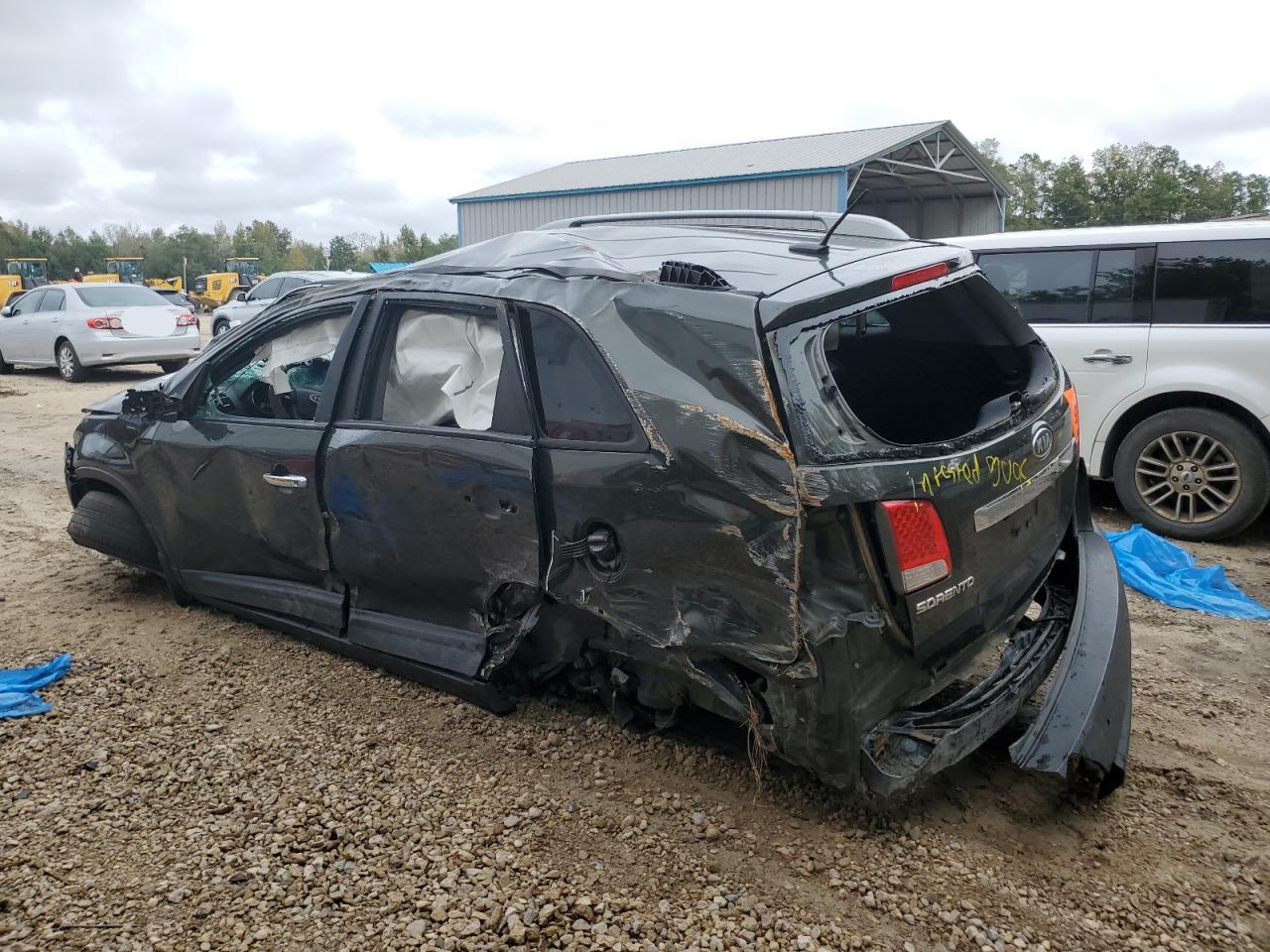 2011 KIA Sorento VIN 5XYKT3A11BG107256 Copart auction photo, rollover damage thumbnail 2