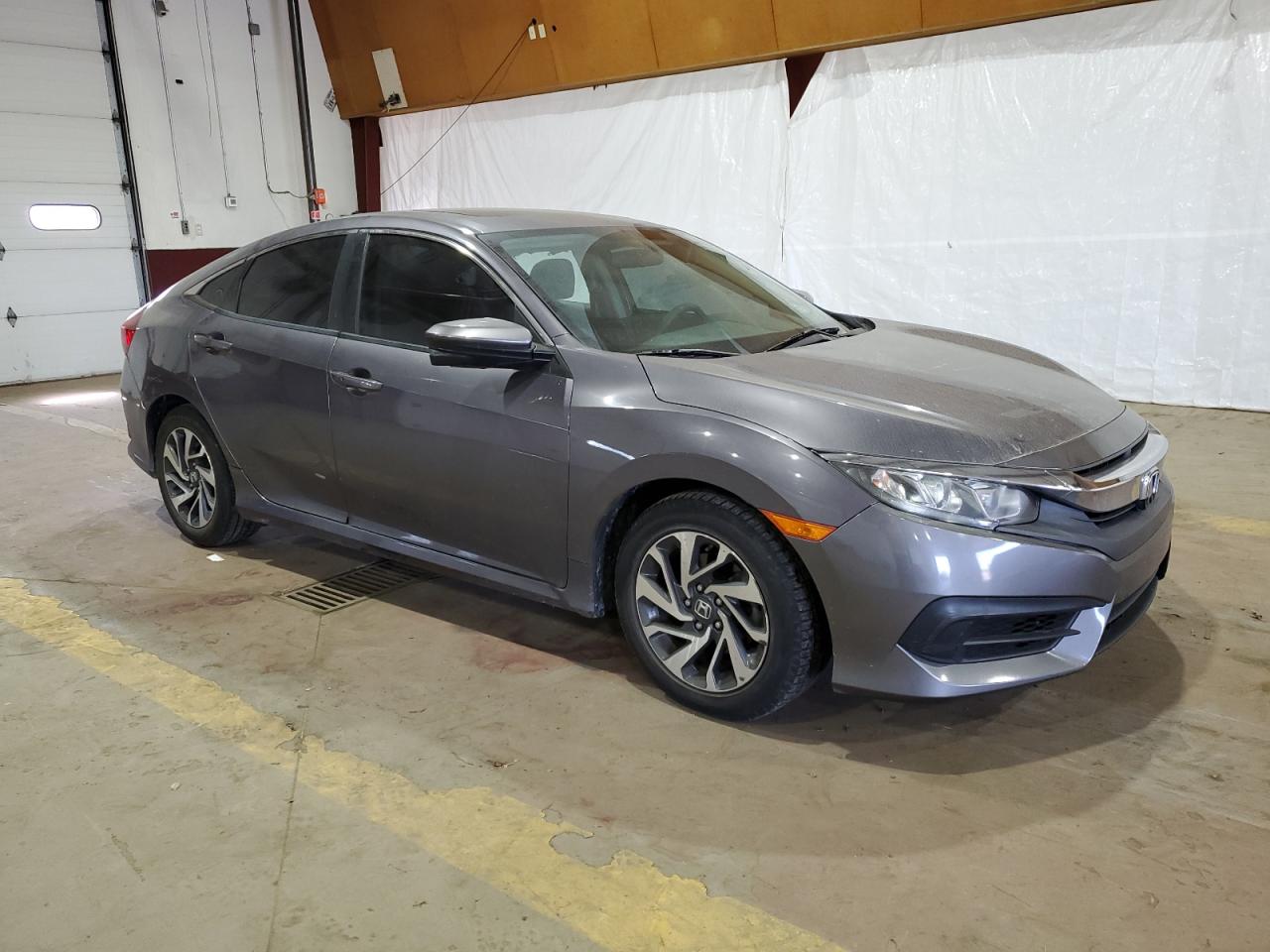 2016 Honda Civic VIN 19XFC2F76GE054874 Copart auction photo, all over damage thumbnail 4