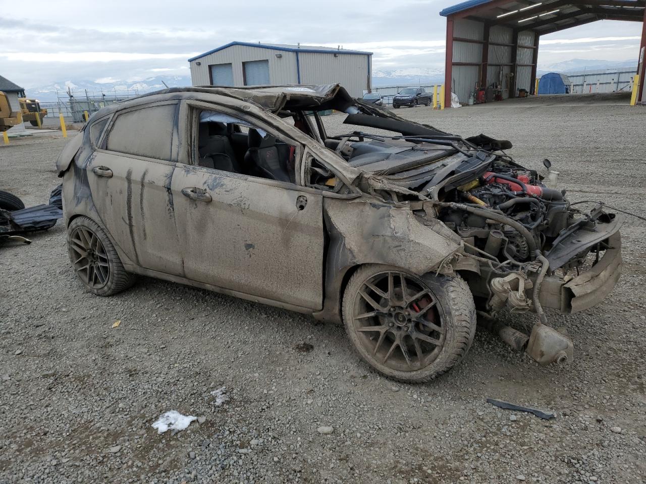 2014 Ford Fiesta VIN 3FADP4GX9EM130943 Copart auction photo, all over / burn damage thumbnail 4