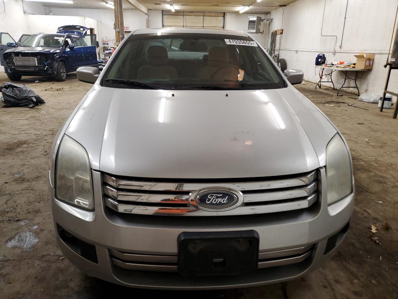 2009 Ford Fusion VIN 3FAHP07159R104855 Copart auction photo, rear end damage thumbnail 5