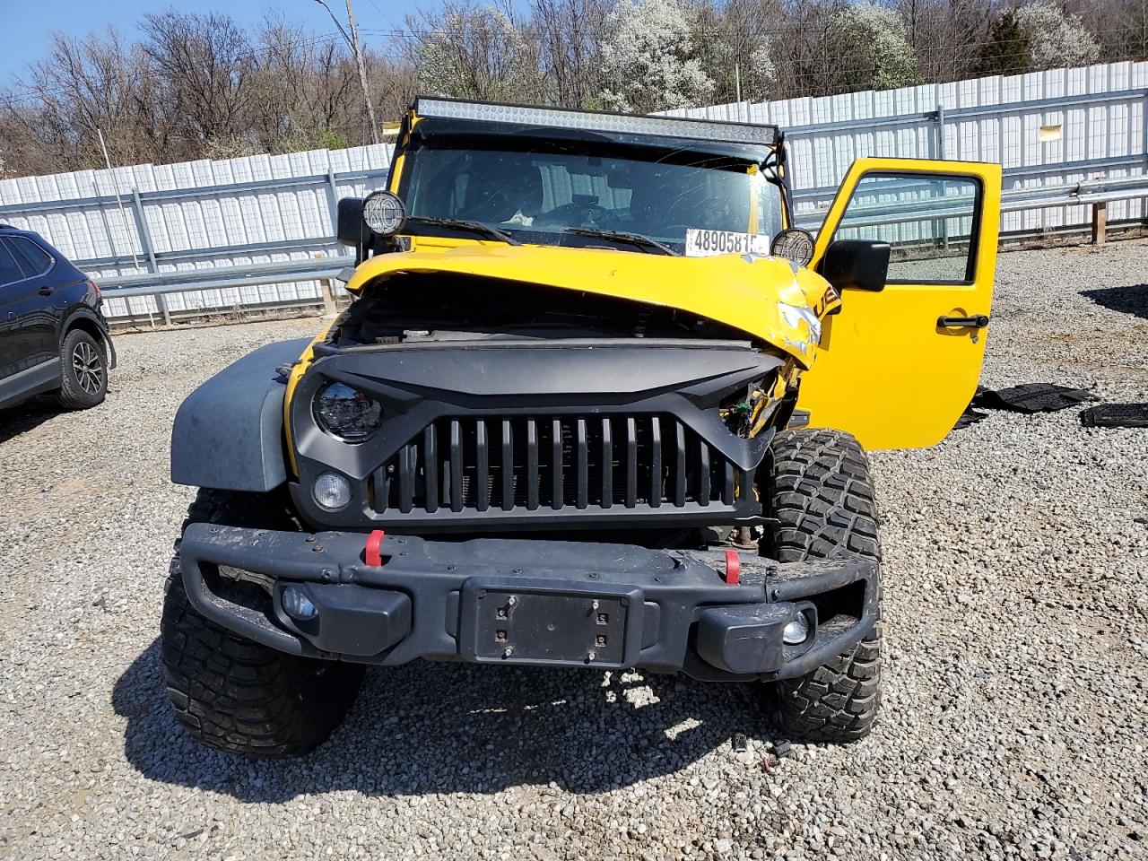 2015 Jeep Wrangler VIN 1C4BJWFG0FL561769 Copart auction photo, front end / side damage thumbnail 5