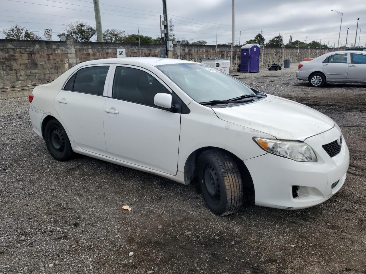 2010 Toyota Corolla VIN 1NXBU4EE7AZ359599 Copart auction photo, side / rear end damage thumbnail 4