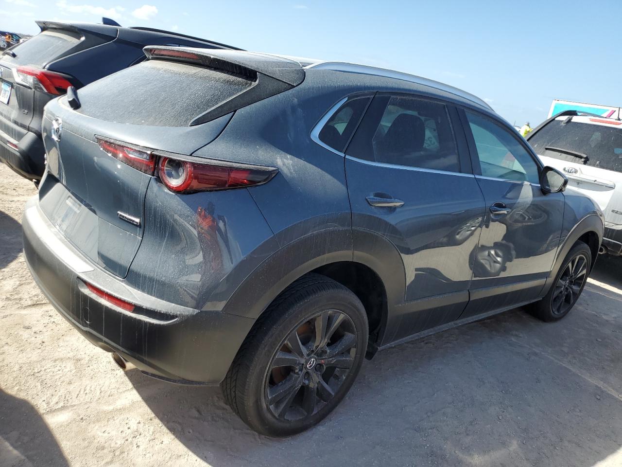 2023 Mazda CX-30 VIN 3MVDMBCM2PM563279 Copart auction photo, water/flood damage thumbnail 3