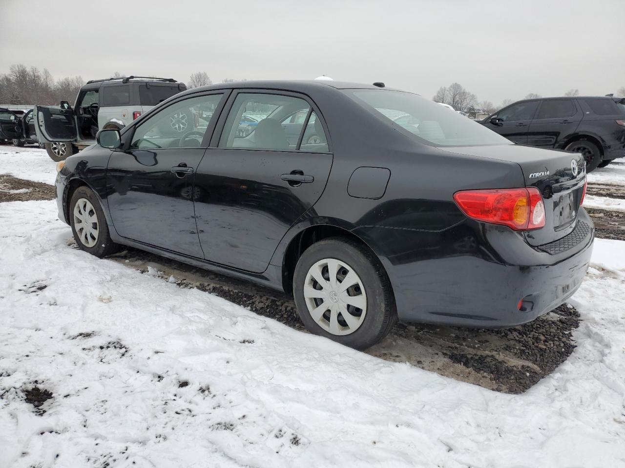 2009 Toyota Corolla VIN JTDBL40E399059488 Copart auction photo, side / front end damage thumbnail 2