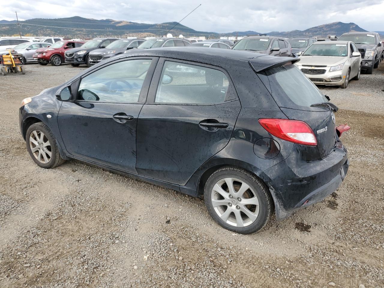 2011 Mazda 2 VIN JM1DE1HY2B0116998 Copart auction photo, side / rear end damage thumbnail 2