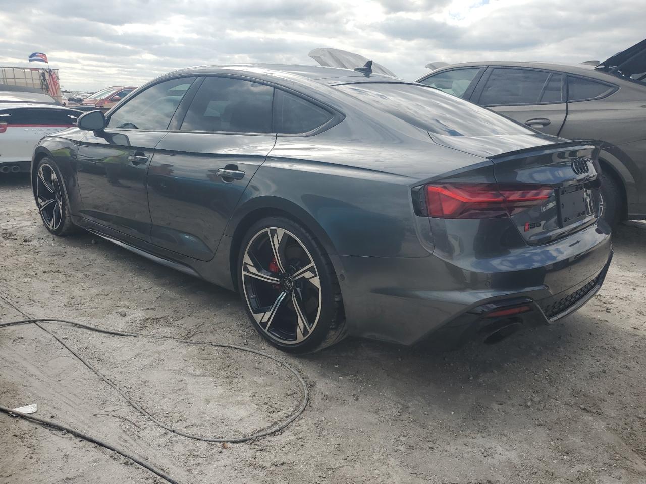 2024 Audi RS5 VIN WUAAWCF54RA900689 Copart auction photo, water/flood damage thumbnail 2