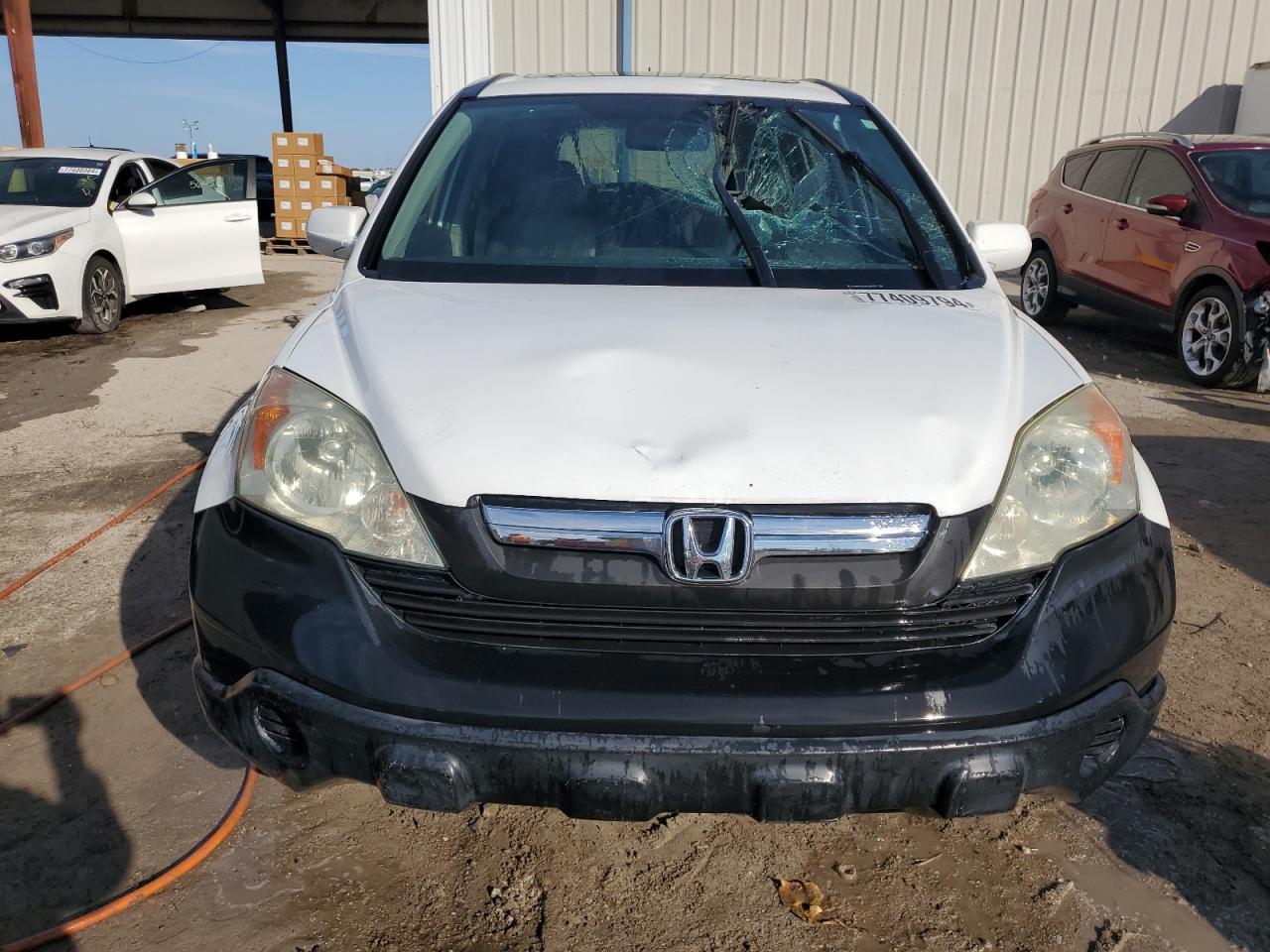 2009 Honda CR-V VIN 5J6RE38729L010756 Copart auction photo, front end damage thumbnail 5