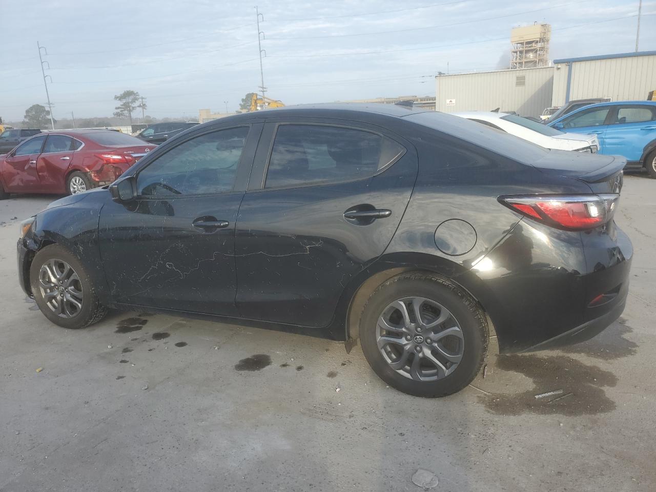 2019 Toyota Yaris VIN 3MYDLBYV4KY513864 Copart auction photo, side / front end damage thumbnail 2
