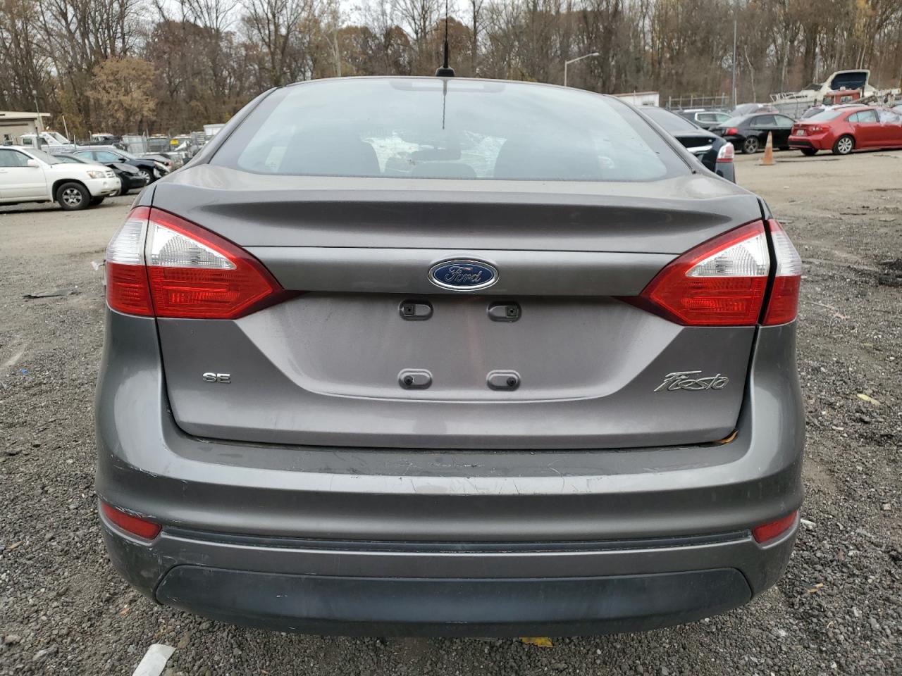 2014 Ford Fiesta VIN 3FADP4BJ1EM110382 Copart auction photo, all over / undercarriage damage thumbnail 6