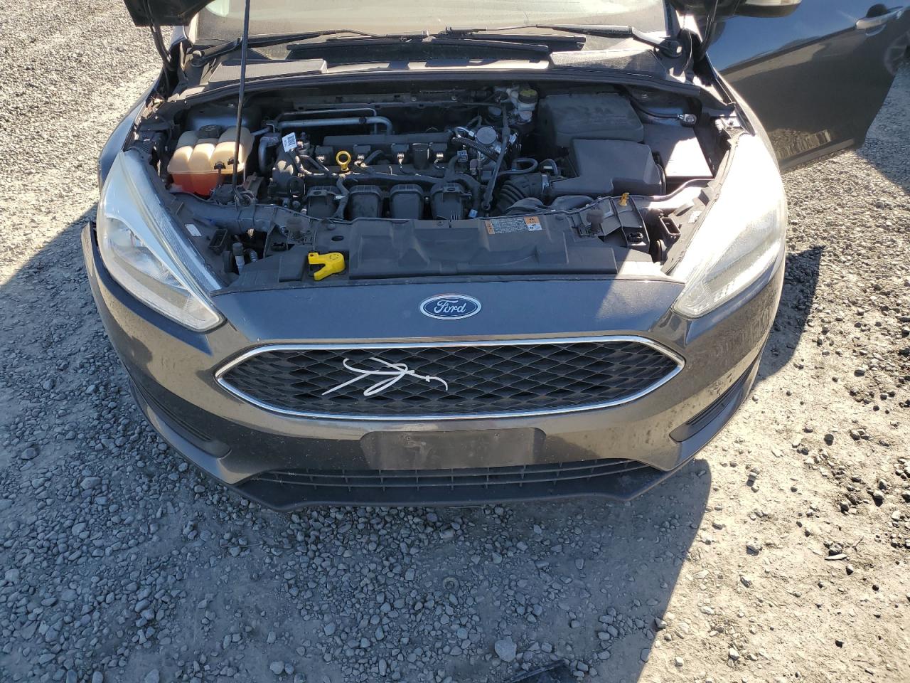 2016 Ford Focus VIN 1FADP3F2XGL337474 Copart auction photo, front end / undercarriage damage thumbnail 11