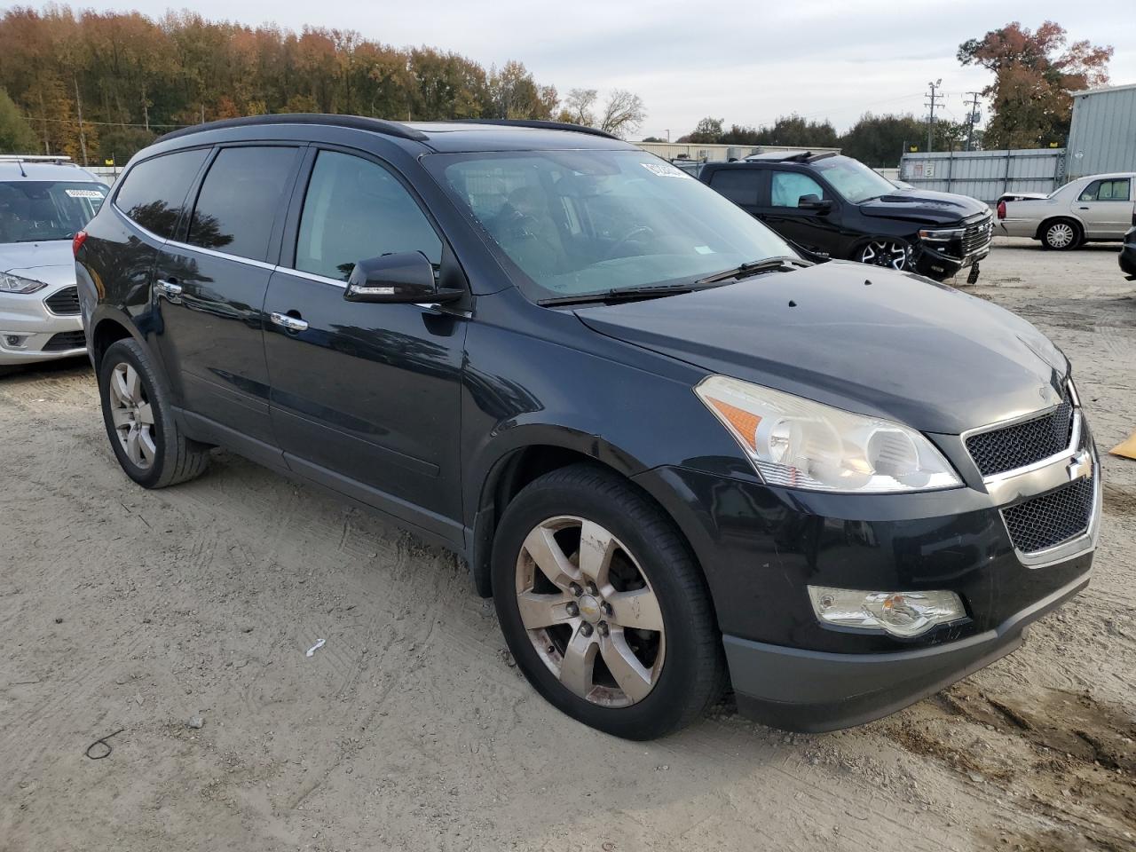 2012 Chevrolet Traverse VIN 1GNKRGEDXCJ275996 Copart auction photo, front end / all over damage thumbnail 4