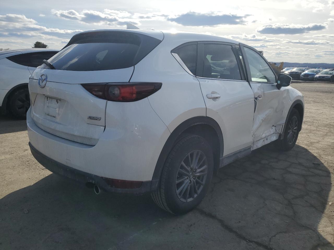 2019 Mazda CX-5 VIN JM3KFBCM4K0541614 Copart auction photo, side damage thumbnail 3