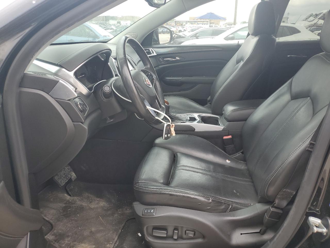 2016 Cadillac SRX VIN 3GYFNDE34GS569520 Copart auction photo, front end damage thumbnail 7
