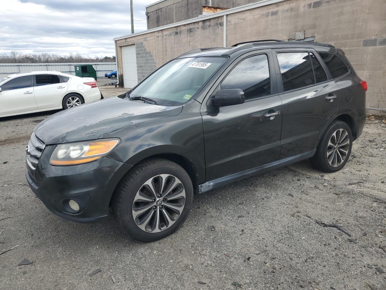 2012 Hyundai Santa Fe VIN 5XYZKDAG1CG145552