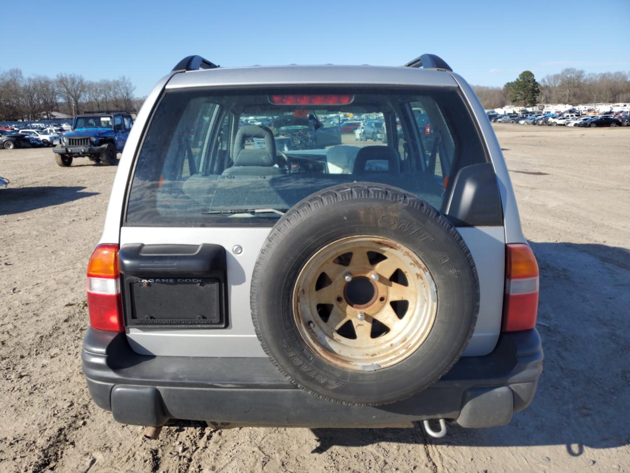 2004 Chevrolet Tracker VIN 2CNBE134846906856 Copart auction photo, front end / side damage thumbnail 6