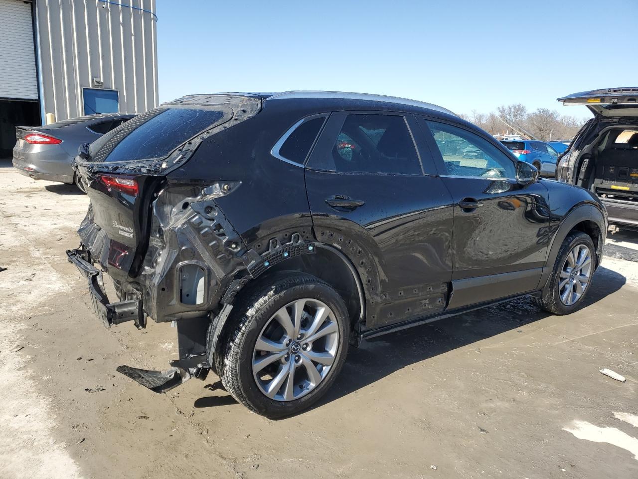 2023 Mazda CX-30 VIN 3MVDMBCMXPM502116 Copart auction photo, rear end damage thumbnail 3