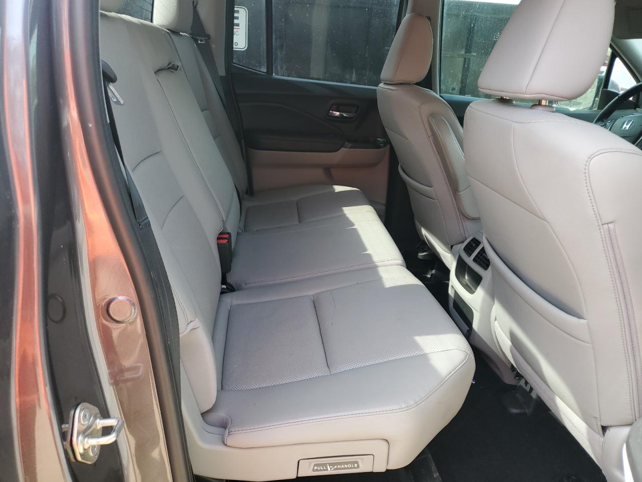 2017 Honda Ridgeline VIN 5FPYK2F65HB010628 Copart auction photo, rear end damage thumbnail 10