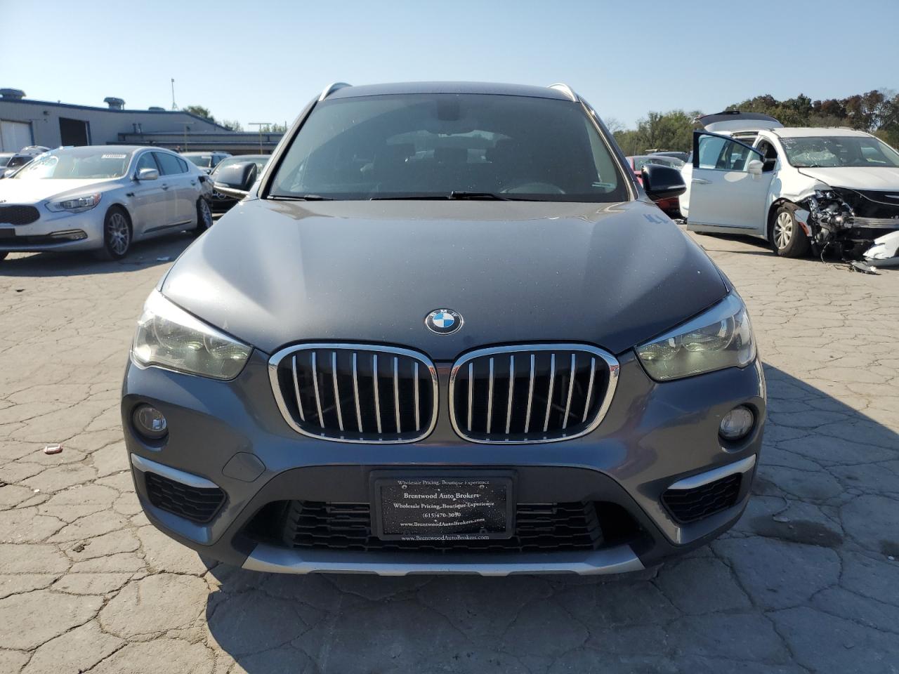 2018 BMW X1 VIN WBXHT3C34J5K30049 Copart auction photo, minor dent/scratches damage thumbnail 5