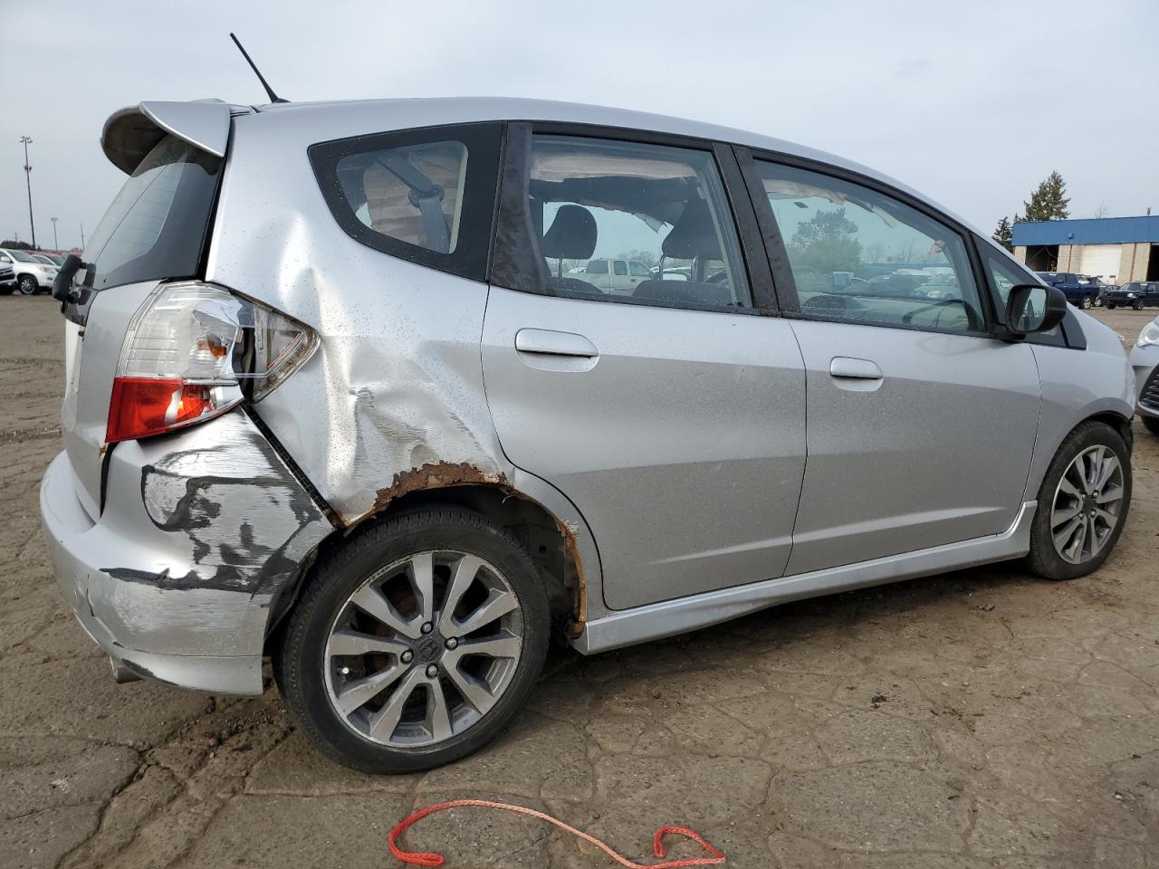 2012 Honda Fit VIN JHMGE8H57CS003385 Copart auction photo, all over damage thumbnail 3