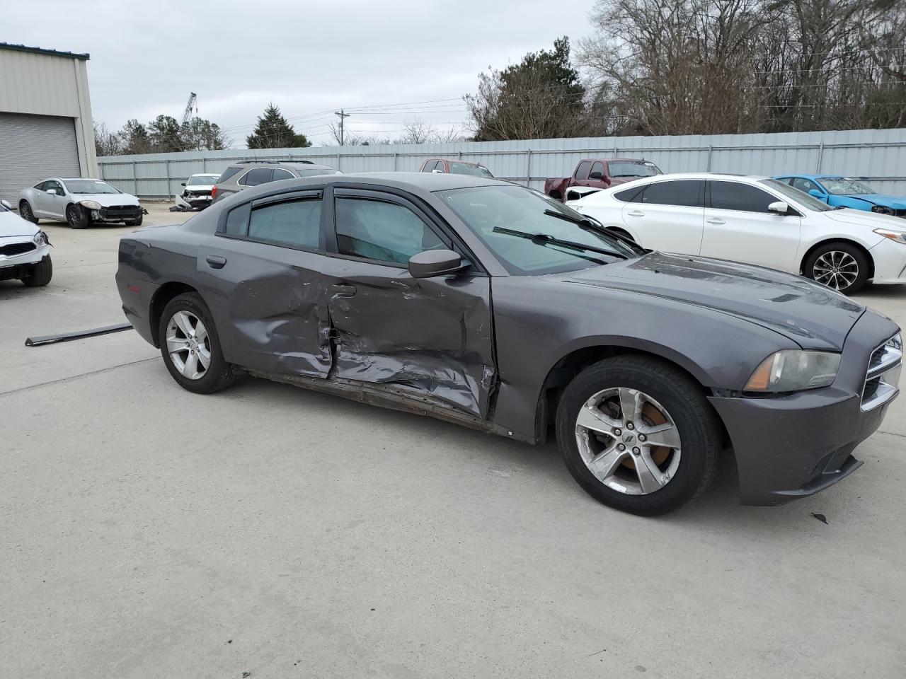 2013 Dodge Charger VIN 2C3CDXBG9DH688512 Copart auction photo, side damage thumbnail 4