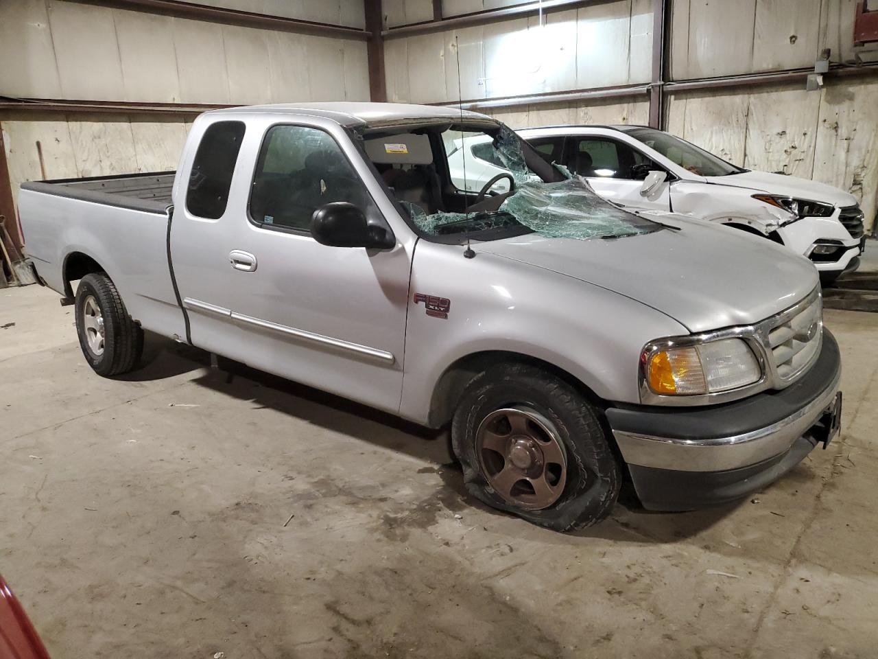 2003 Ford F-150 VIN 2FTRX17W93CA57586 Copart auction photo, all over / undercarriage damage thumbnail 4