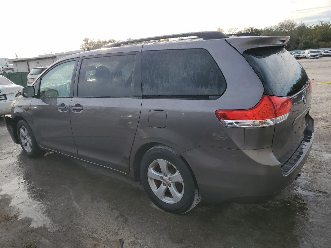 2011 Toyota Sienna VIN 5TDKK3DC0BS175700 Copart auction photo, side / front end damage thumbnail 2