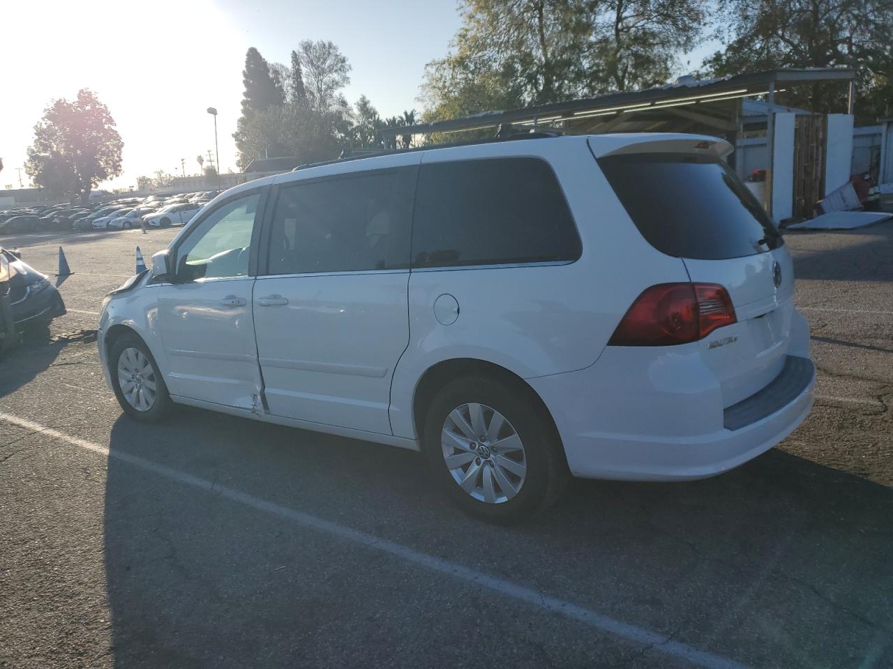 2012 Volkswagen Routan VIN 2C4RVACG3CR293961 Copart auction photo, front end / undercarriage damage thumbnail 2