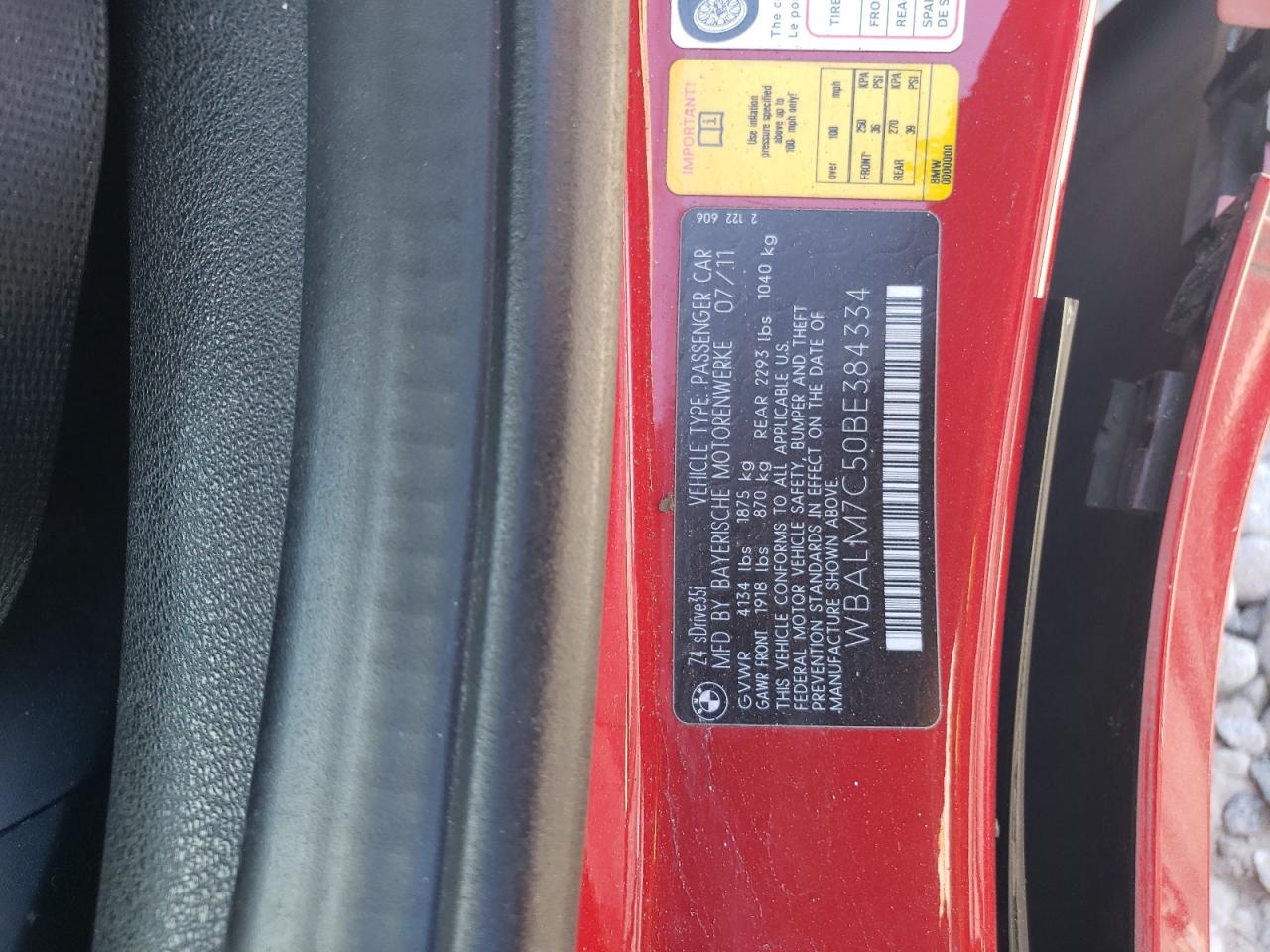 2011 BMW Z4 VIN WBALM7C50BE384334 Copart auction photo, rear end / side damage thumbnail 12
