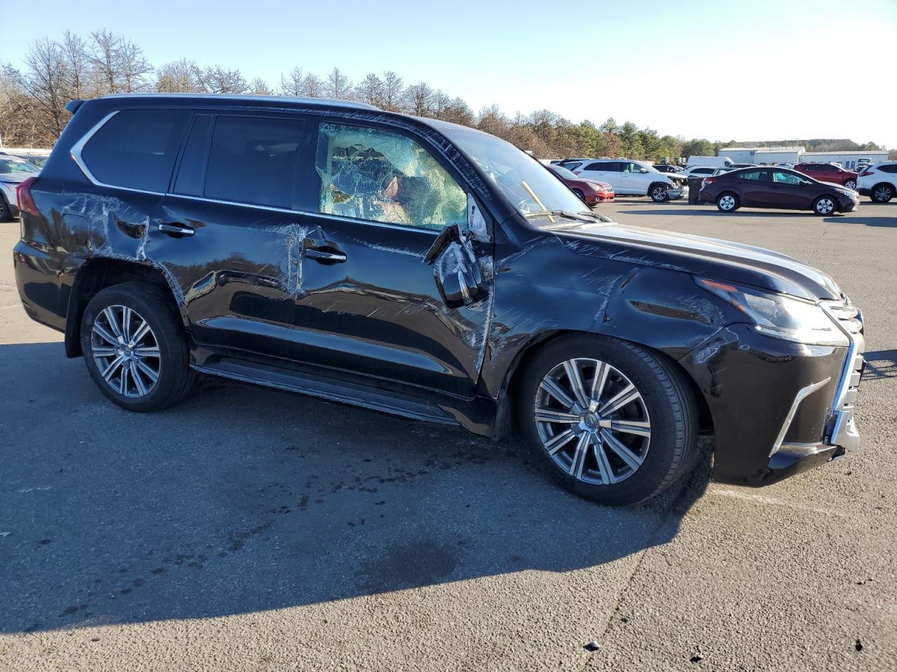 2016 Lexus LX VIN JTJHY7AX7G4217318 Copart auction photo, rollover / minor dent/scratches damage thumbnail 4