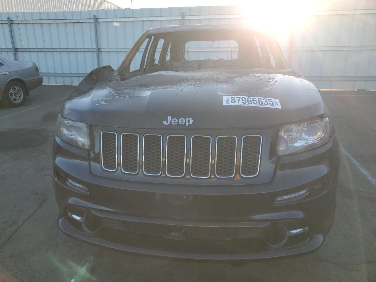 2012 Jeep Grand Cherokee VIN 1C4RJFDJ1CC311983 Copart auction photo, burn damage thumbnail 5