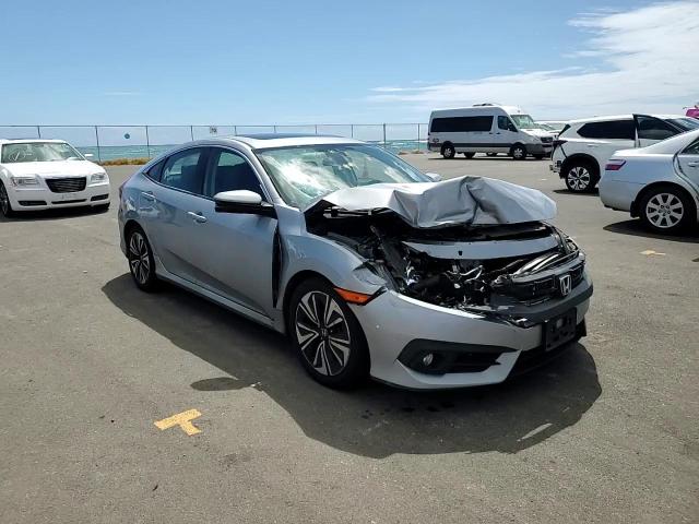 2016 Honda Civic VIN 2HGFC1F31GH651556 Copart auction photo, front end / side damage thumbnail 11