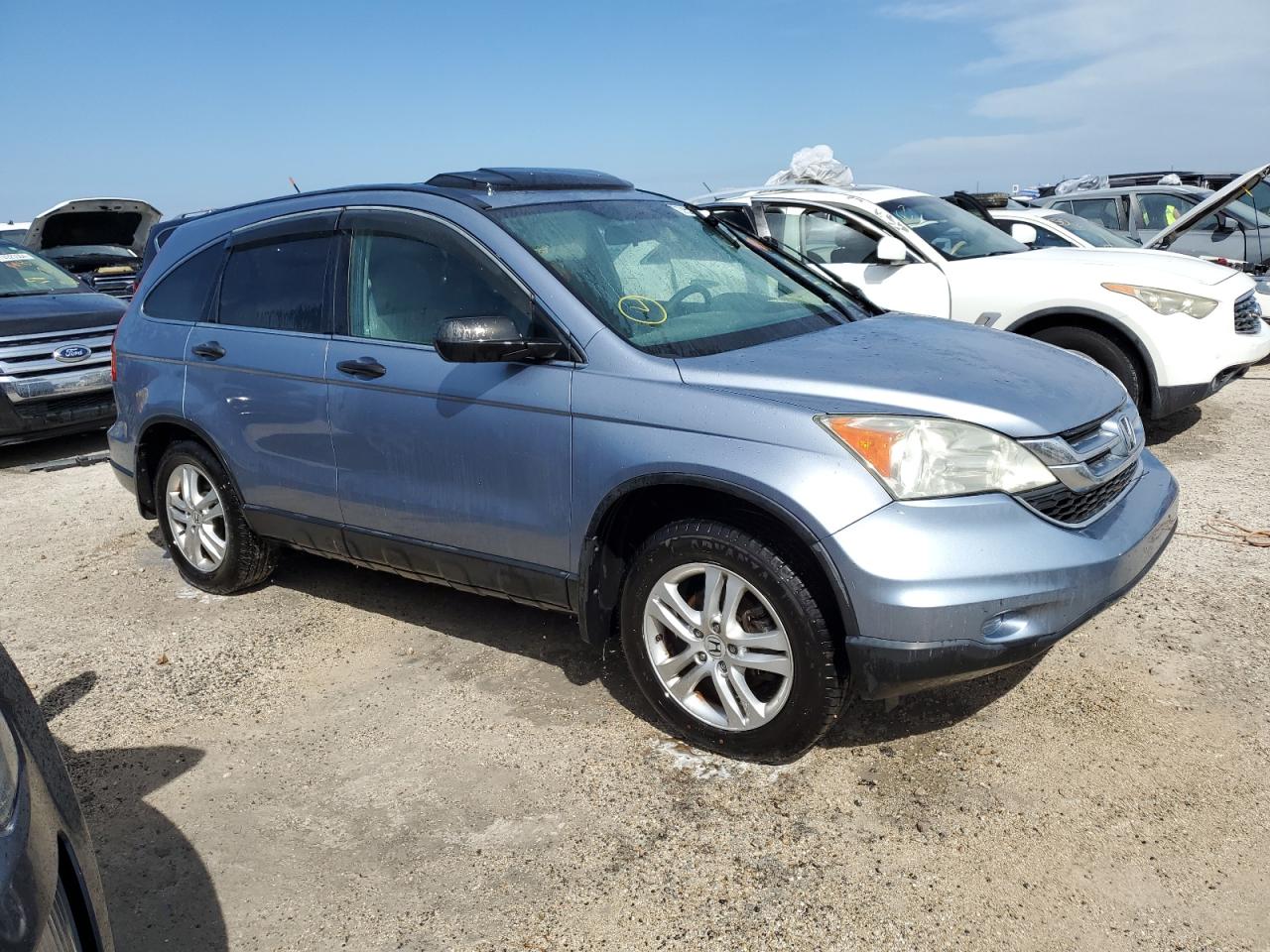 2010 Honda CR-V VIN 3CZRE3H57AG702494 Copart auction photo, water/flood damage thumbnail 4