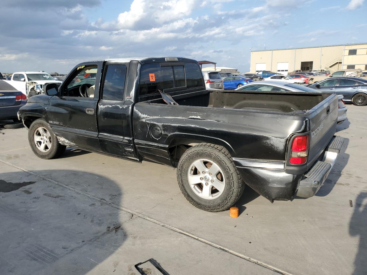 2000 Dodge RAM VIN 3B7HC13YXYG104164 Copart auction photo, side / hail damage thumbnail 2